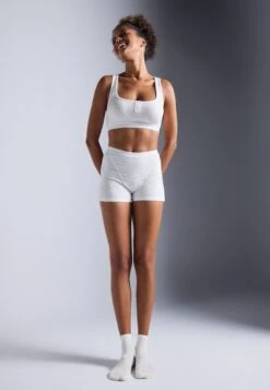 LIGHT SUPPORT FINE RIBBED SPORTS BRA WITH RACER BACK - Sport-bh Met Medium Support - White -Even-Odd Winkel cdac350b5e98483abc89052896456949